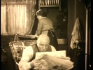 The Lodger (1927)Marie Ault and newspaper